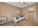 Cozy bedroom with a single bed, side table, and a closet, perfect for a room at 7815 Red Rock Ridge Ave, Las Vegas, NV 89179