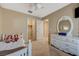 Charming bedroom with white furniture, including bed and dresser, plus closet for ample storage at 7815 Red Rock Ridge Ave, Las Vegas, NV 89179