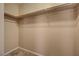 Well-organized closet with a single shelf, and a rod for hanging clothes offering efficient storage at 7815 Red Rock Ridge Ave, Las Vegas, NV 89179