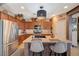 Spacious kitchen with stainless steel appliances, granite countertops and ample cabinet space at 7815 Red Rock Ridge Ave, Las Vegas, NV 89179