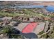 Gorgeous aerial view of residential land for sale with community amenities, water views and nearby golf course at 8 Via Verona Ct, Henderson, NV 89011