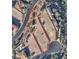 Great aerial shot of the homesite in a beautiful community with mountain views and lush landscaping at 8 Via Verona Ct, Henderson, NV 89011