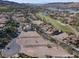 Excellent aerial view of residential land for sale in a beautiful golf community with lake access and mountain views at 8 Via Verona Ct, Henderson, NV 89011