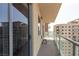 Balcony featuring chair and glass panels at 8255 Las Vegas Blvd # 1908, Las Vegas, NV 89123