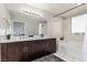 Bathroom with double vanity, tub, and tile flooring at 8255 Las Vegas Blvd # 1908, Las Vegas, NV 89123