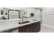 Stylish kitchen overlooking the living area features white countertops and stainless steel appliances at 8255 Las Vegas Blvd # 1908, Las Vegas, NV 89123