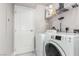 Laundry room with white washer and dryer at 8255 Las Vegas Blvd # 1908, Las Vegas, NV 89123
