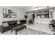 Modern living room with a comfortable sofa, stylish decor, and a view into the kitchen at 8255 Las Vegas Blvd # 1908, Las Vegas, NV 89123