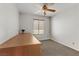 Neutral bedroom featuring a ceiling fan and a large desk by the window at 8313 Sky Canyon Ct, Las Vegas, NV 89128