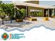 Exterior of a modern community center building with a geometric design, surrounded by landscaping and seating at 8519 Little Fox St, Las Vegas, NV 89123