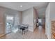 Dining area adjacent to kitchen with sliding glass doors that provide backyard access at 8519 Little Fox St, Las Vegas, NV 89123