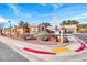 Inviting single-story home with well-maintained landscaping and neutral color palette at 8519 Little Fox St, Las Vegas, NV 89123
