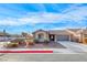 Charming single-story home featuring desert landscaping and an attached two-car garage at 8519 Little Fox St, Las Vegas, NV 89123