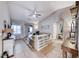 Bright living area featuring tile floors, neutral walls and comfortable seating at 8519 Little Fox St, Las Vegas, NV 89123