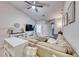 Bright living area featuring tile floors, neutral walls and comfortable seating at 8519 Little Fox St, Las Vegas, NV 89123