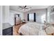 Spacious main bedroom featuring wood-look flooring and an airy, comfortable atmosphere at 8519 Little Fox St, Las Vegas, NV 89123