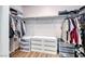Spacious walk-in closet with ample shelving and hanging space for clothes and accessories at 8519 Little Fox St, Las Vegas, NV 89123