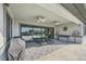 The backyard patio includes outdoor furniture, ceiling fans, and sliding glass doors at 9475 W Rosada Way, Las Vegas, NV 89149