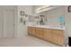Bright bathroom featuring a double sink vanity with wood cabinets and neutral countertops at 1433 Erskine Ave, Las Vegas, NV 89123