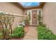 Inviting front porch area with greenery, decor, and a charming seating arrangement at 1433 Erskine Ave, Las Vegas, NV 89123