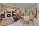 Comfortable living area features a fireplace, plush seating, and lots of natural light at 1433 Erskine Ave, Las Vegas, NV 89123
