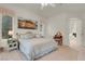 Inviting main bedroom with light-filled windows and carpet floors at 1433 Erskine Ave, Las Vegas, NV 89123