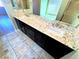 Close-up of a bathroom vanity with double sinks and stylish marble countertop at 1630 Meadow Bluffs Ave, Henderson, NV 89014