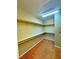 Walk-in closet with built-in shelving and ample storage space at 1630 Meadow Bluffs Ave, Henderson, NV 89014