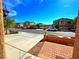 View from the front door of the street with houses in the background at 1630 Meadow Bluffs Ave, Henderson, NV 89014