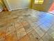 Spacious living room features neutral walls and large tile floors at 1630 Meadow Bluffs Ave, Henderson, NV 89014