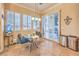 A cozy breakfast nook is drenched with natural light from the sliding glass door at 258 Spring River Ave, Las Vegas, NV 89123