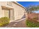 Private courtyard leads to the front door, complemented by easy-care desert landscaping at 258 Spring River Ave, Las Vegas, NV 89123