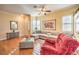Bright living room with hardwood floors, neutral paint, and views of entry at 258 Spring River Ave, Las Vegas, NV 89123