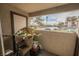 Charming balcony area decorated with potted flowers and views of the community at 2606 S Durango Dr # 152, Las Vegas, NV 89117