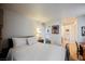 Bedroom with neutral colored walls and carpet and a bathroom access at 2606 S Durango Dr # 152, Las Vegas, NV 89117