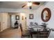 Dining area with carpet flooring, a fan, and table with seating at 2606 S Durango Dr # 152, Las Vegas, NV 89117