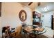 Cozy dining area with a ceiling fan and glass table for dining at 2606 S Durango Dr # 152, Las Vegas, NV 89117