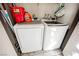 Convenient laundry area featuring modern washer and dryer units at 2606 S Durango Dr # 152, Las Vegas, NV 89117