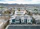 Wide aerial view of 2699 Chance Canyon St, with lush landscaping and mountain views at 2699 Chance Canyon St, Henderson, NV 89044