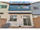 Back of home with a cozy patio, showcasing outdoor living space for relaxation and entertaining at 2699 Chance Canyon St, Henderson, NV 89044