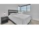 Bright bedroom featuring modern decor, large windows and a comfortable bed at 2699 Chance Canyon St, Henderson, NV 89044