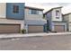 Modern townhouse featuring a two-car garage and contemporary design elements at 2699 Chance Canyon St, Henderson, NV 89044