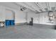 Spacious two-car garage with epoxy flooring and modern amenities at 2699 Chance Canyon St, Henderson, NV 89044