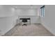Cozy loft area featuring a desk setup, neutral carpet, and a minimalist design, ideal for a home office or study at 2699 Chance Canyon St, Henderson, NV 89044