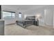 Spacious main bedroom with carpet, lamps, and plenty of natural light from the windows at 2699 Chance Canyon St, Henderson, NV 89044