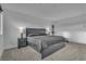 Spacious primary bedroom featuring lamps, carpet, and great natural light at 2699 Chance Canyon St, Henderson, NV 89044
