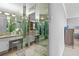 Bright bathroom vanity area featuring mirrored wall and walk-in closet at 3111 Bel Air Dr # 20D, Las Vegas, NV 89109