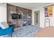 Comfortable bedroom with a built-in bookcase, desk and a cozy reading chair for relaxation and entertainment at 3111 Bel Air Dr # 20D, Las Vegas, NV 89109
