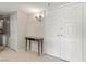Inviting entryway featuring a modern console table and double doors, offering a stylish welcome to the home at 3111 Bel Air Dr # 20D, Las Vegas, NV 89109