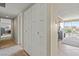 Bright hallway featuring tiled floors and a closet for ample storage space near the living area and bedroom at 3111 Bel Air Dr # 20D, Las Vegas, NV 89109
